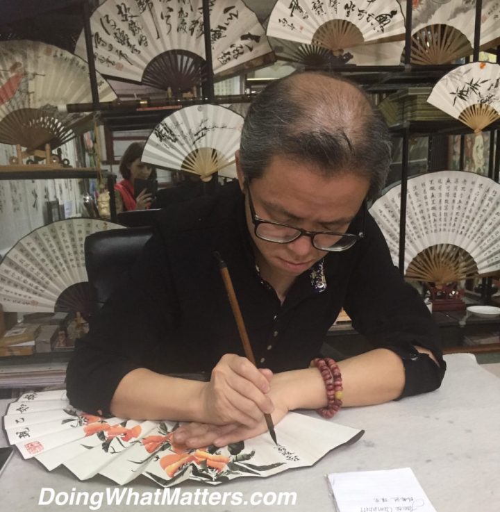 Calligraphy artist at work.
