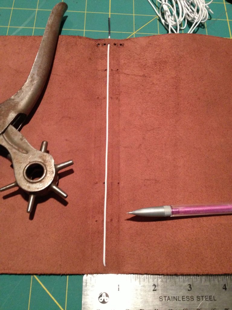 Use a leather punch or awl to make holes for elastic.