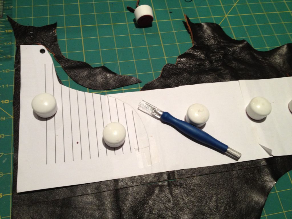 Cut leather to make organizer pocket.