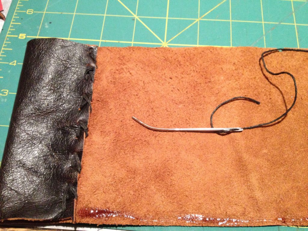 Make a pen pocket by folding the leather.