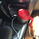 The Mighty Mug fit into the car cup holder just fine. 