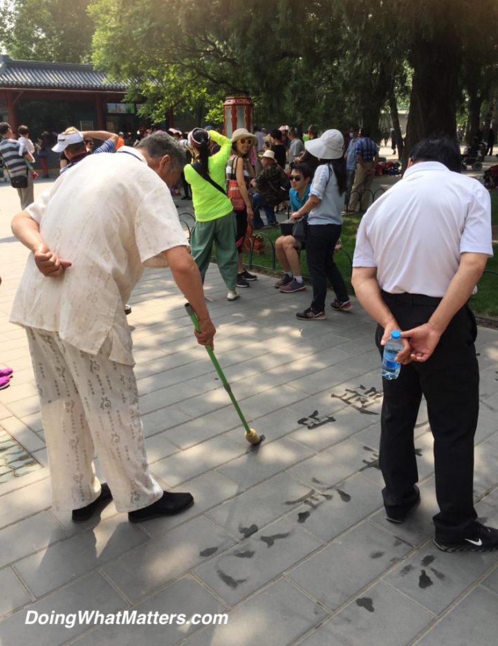 We enjoyed watching this calligrapher write poetry on the sidewalk with water.