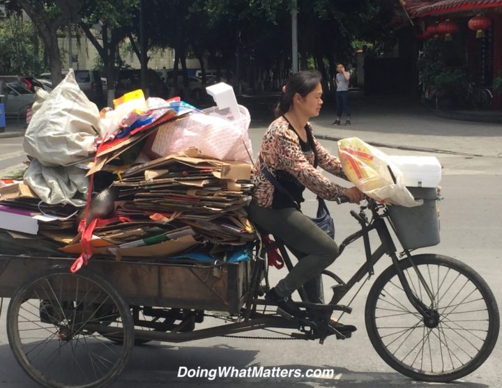 Hauling lots of stuff on a tricycle-powered cart.